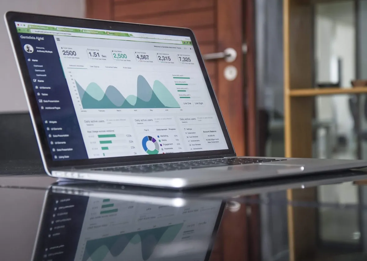 UK small business owner comparing website cost quotes across DIY builders, freelancers and agencies
